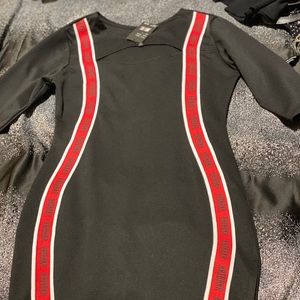 Brand new , never worn Red and black dress